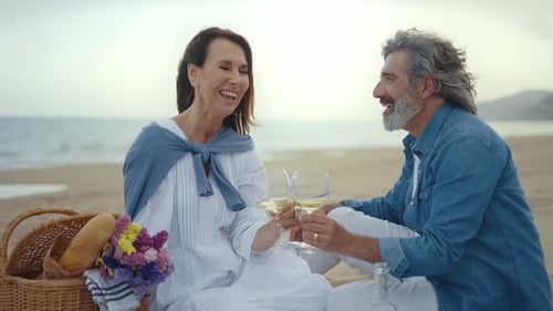 senior couple spending time on the beach