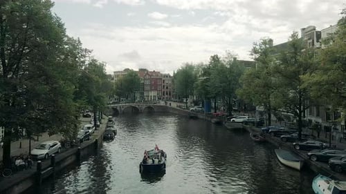 Drone Shot Over Amsterdam Canal Towards The Oude Cc 01