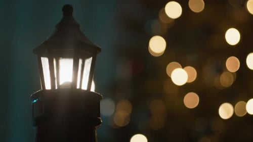 Nighttime Street Lamp with Bokeh Christmas Lights Background