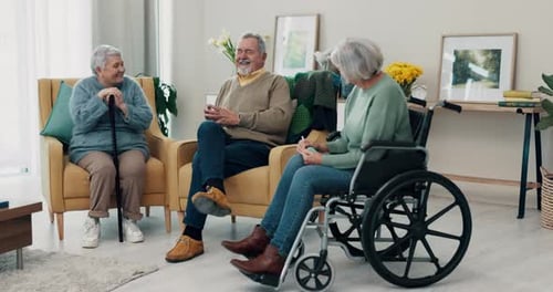 Seniors Conversing Together in Sunny Home