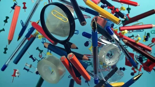 Different School Tools Fly Up and Down Back to School Filmed on a Highspeed Camera at 1000 Fps