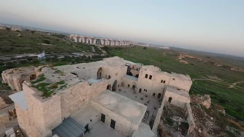 fpv video sunset view of the Crusader Ottoman Fortress of Migdal Tsedek