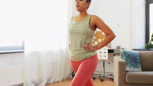 Fitness, Sport and Healthy Lifestyle Concept - African American Woman Exercising And