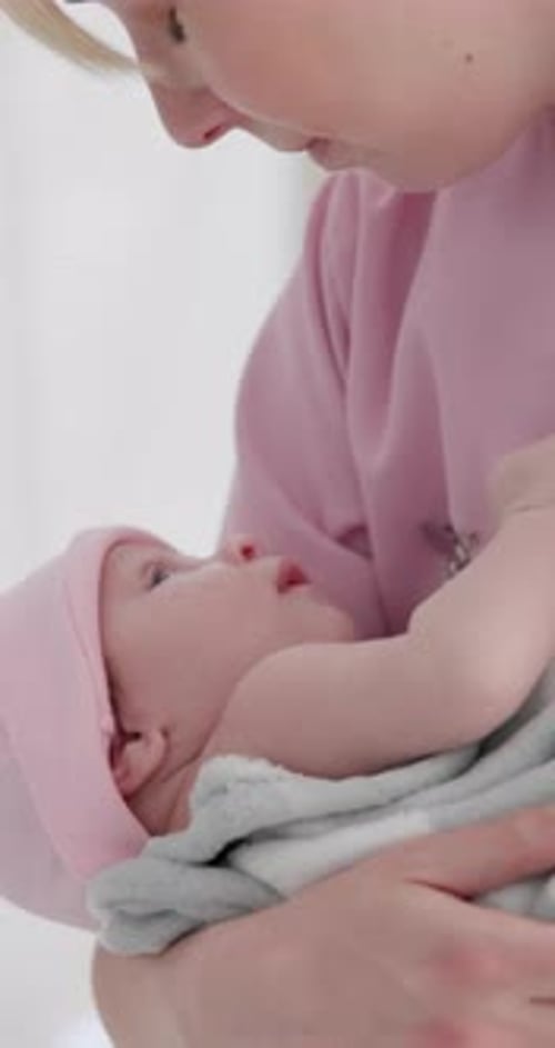 Nurse, woman and baby in hospital for wellness, medical checkup or examination with support or care