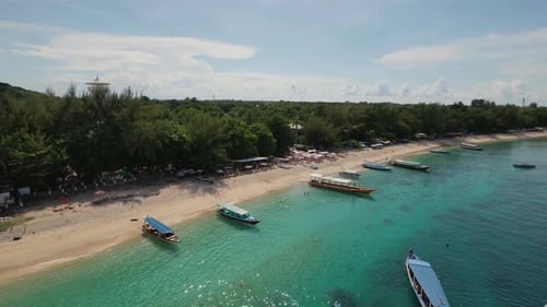 4K drone video of fishing boats on the beach on Gili T island, Lombok Indonesia