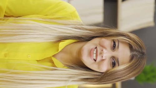 Woman with Blond Hair Talking to Camera