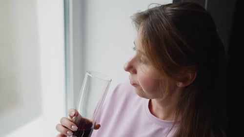 Overhead View White Lady Drinking Wine Near Window Enjoying Natural Daylight