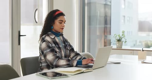 Business, woman and typing on laptop in office for research, editing article and review feedback