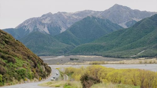 Vehicles driving along the state highway through Arthurs Pass, New Zealand
