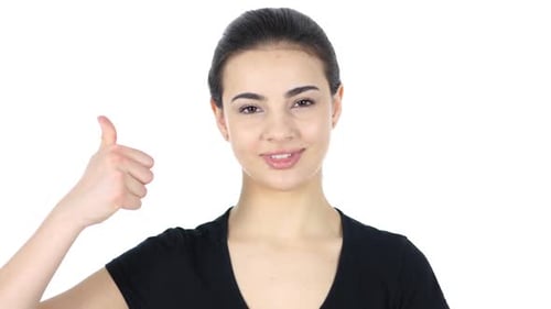 Woman Gives Thumbs Up on White Background