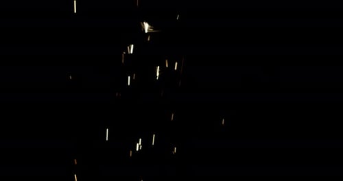 Collider Collection: Stuttering spark effect shooting up over a black background