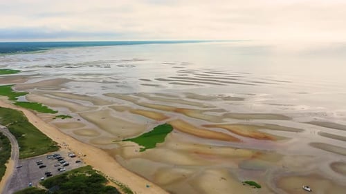 Public Beach Access with Tidal Flats, Parking Lot, and Seaside Homes