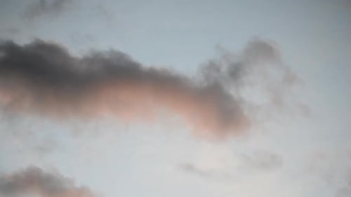 Clouds Moving Slowly at Sunset