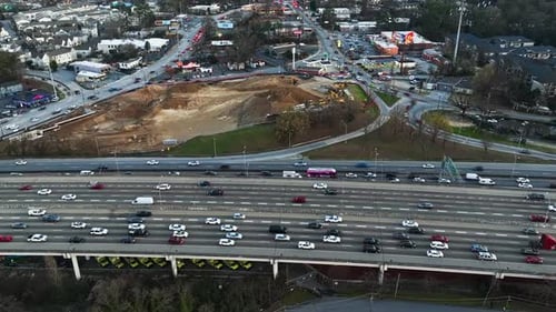 Interstate Highway 285 With Vehicles Driving In Atlanta City, Georgia. aerial shot