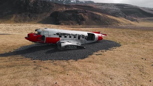 Cinematic 4K Aerial Footage of Abandoned Military Aircraft Wreck in Icelandic Grassland