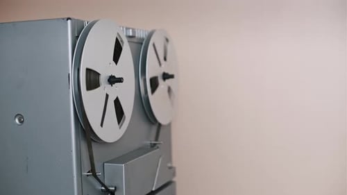 Classic Reel-to-Reel Tape Recorder Spinning Indoors