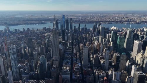 Aerial video above skyscrapers and skyline in Manhattan, New York