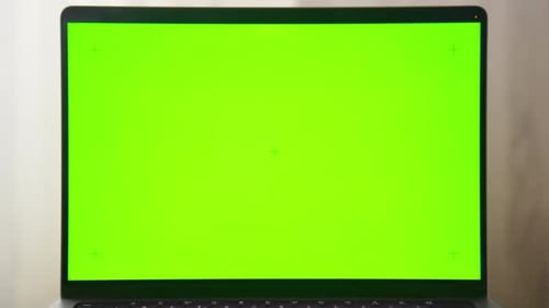 Laptop with Green Screen Fly Out Shot