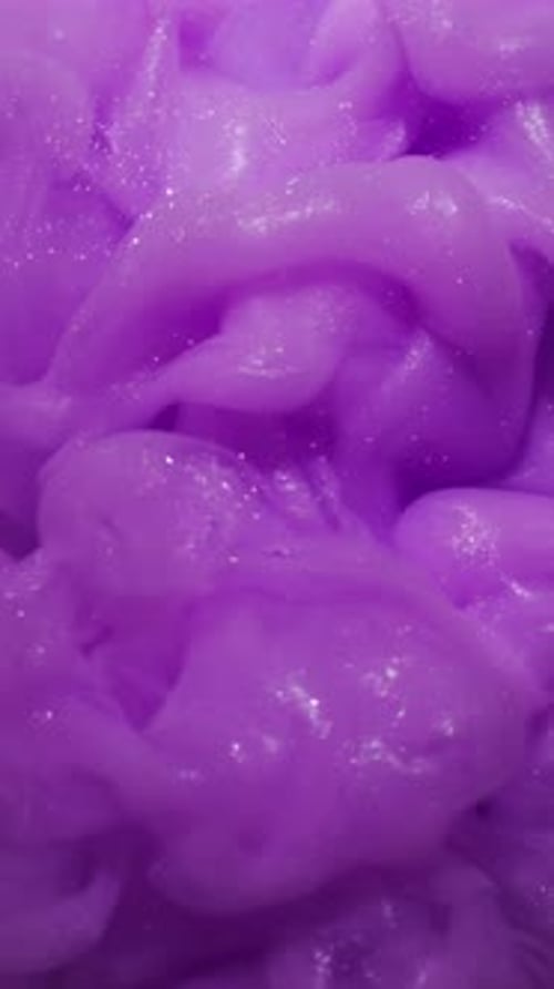 Flowing Purple Abstract Background with Glitter