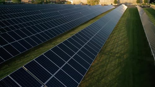 Aerial View of Solar Panels Stand in a Row in the Fields Green Energy Landscape Electrical Power