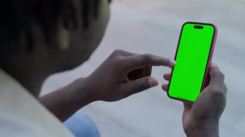 Person Tapping on Smartphone Notification with Green Screen
