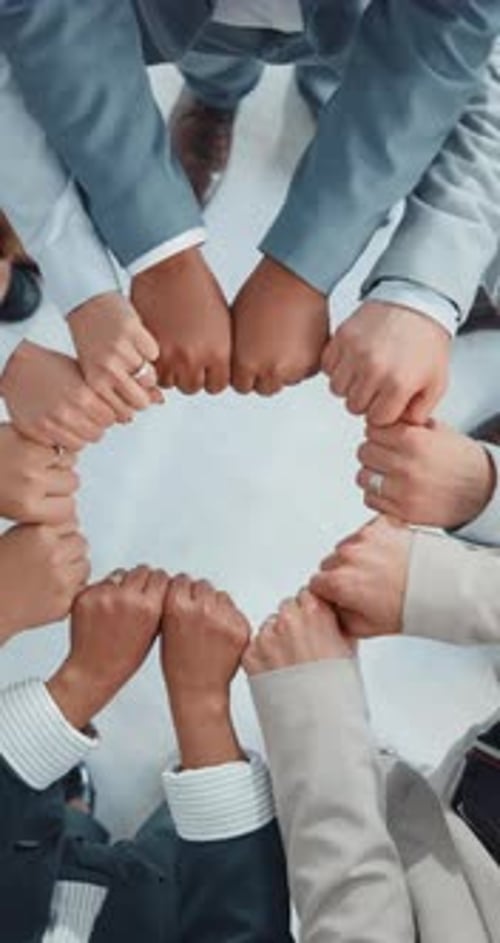 Hands, business and people with fist bump in office for teamwork, motivation and staff support