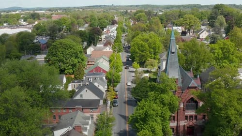 Aerial establishing shot of Lititz Pennsylvania. Chapel at Linden Hall campus. Historic restores hom