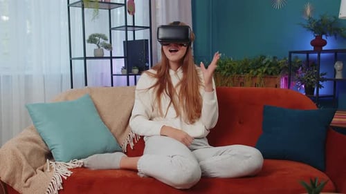 Woman Enjoys Virtual Reality at Home