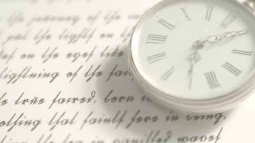 Antique Watch on Old Handwritten Manuscript