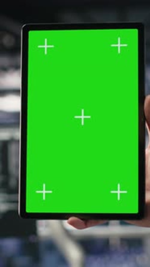 Vertical Video Close Up of Data Center Admin Using Mockup Tablet to Update Software