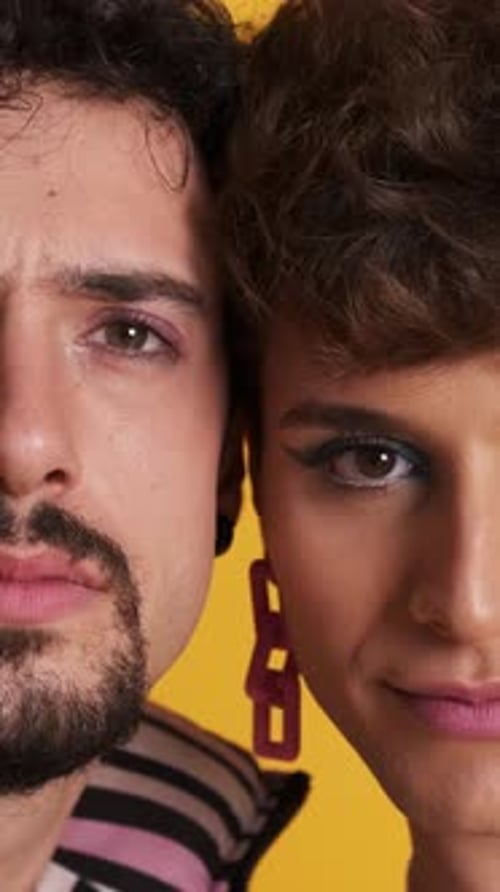 Close Up of Gay Couple in Makeup Looking at the Camera