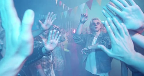 Close Up Hand Man Greetings with Friends on Party Night Drinking Alcohol Having Fun on Weekend