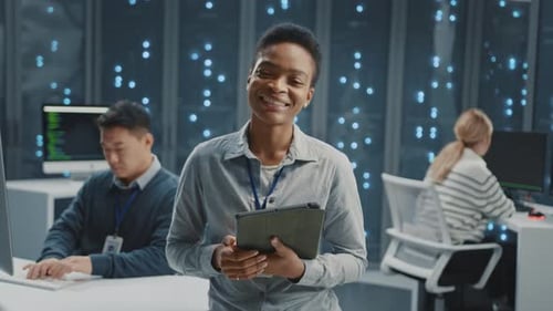 Portrait of Cheerful African American IT Manager Operator Woman Posing Proudly in Digital Center