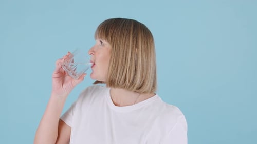 Woman Drinks Refreshing Water, Healthy Lifestyle