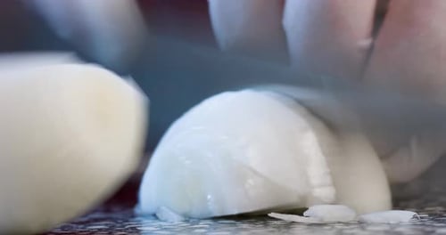 Chef Dicing Onion for Culinary Preparation