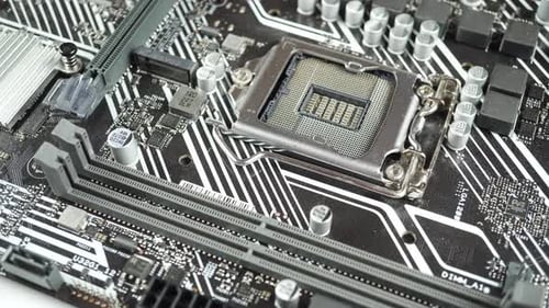 Close Up Of Rotating Motherboard With Other System Components.