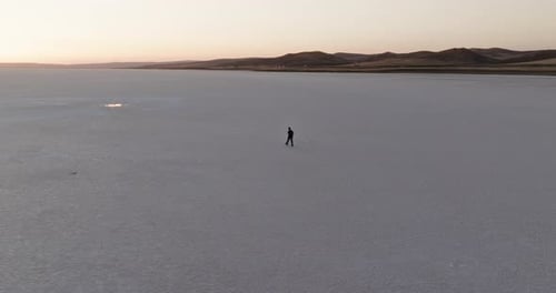 Aerial drone shot of person walking on Salt Lake in Ankara, Turkey