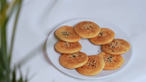 Woman Taking Delicious Cookies From Plate