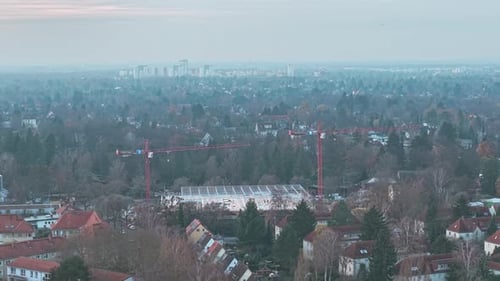 Aerial View of City Construction Site with Cranes