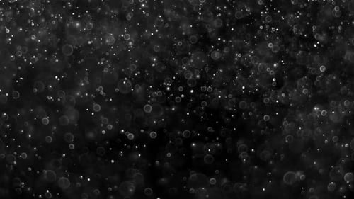 Abstract Bokeh Particles Floating in Dark Space