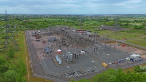 Aerial drone view of an electric power substation near Stevenage, England. Showing energy infrastruc