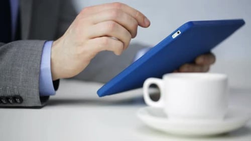 Business, Education, People and Technology Concept - Close Up of Businessman With