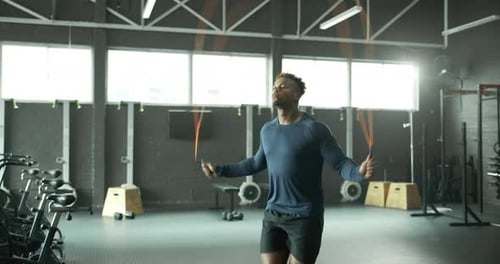 Jump, skipping rope or black man with fitness for body health, training