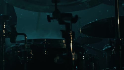 Drummer Man Playing Drums Under Snow Falling. Close Up of Drumming Man