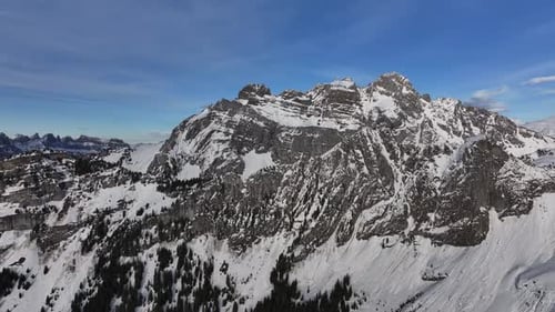 Aerial view of the winter vista of the Fronalpstock, a majestic peak in the Glarus Alps, situated ea