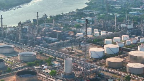 Aerial view of oil refinery and petroleum terminal with storage tanks