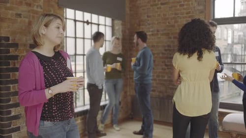 Professionals Networking at Corporate Event with Drinks