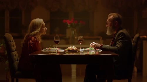 Elegant Senior Couple Having a Romantic Dinner