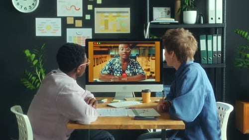 Colleagues Meeting for Video Conference in Office