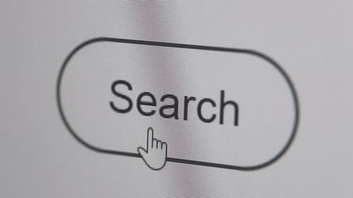 Clicking search button on the computer screen